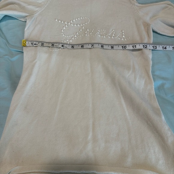 Guess Women’s XS Cold Shoulder. White Faux Pearl Logo Long-Sleeve Top. - Picture 3 of 9